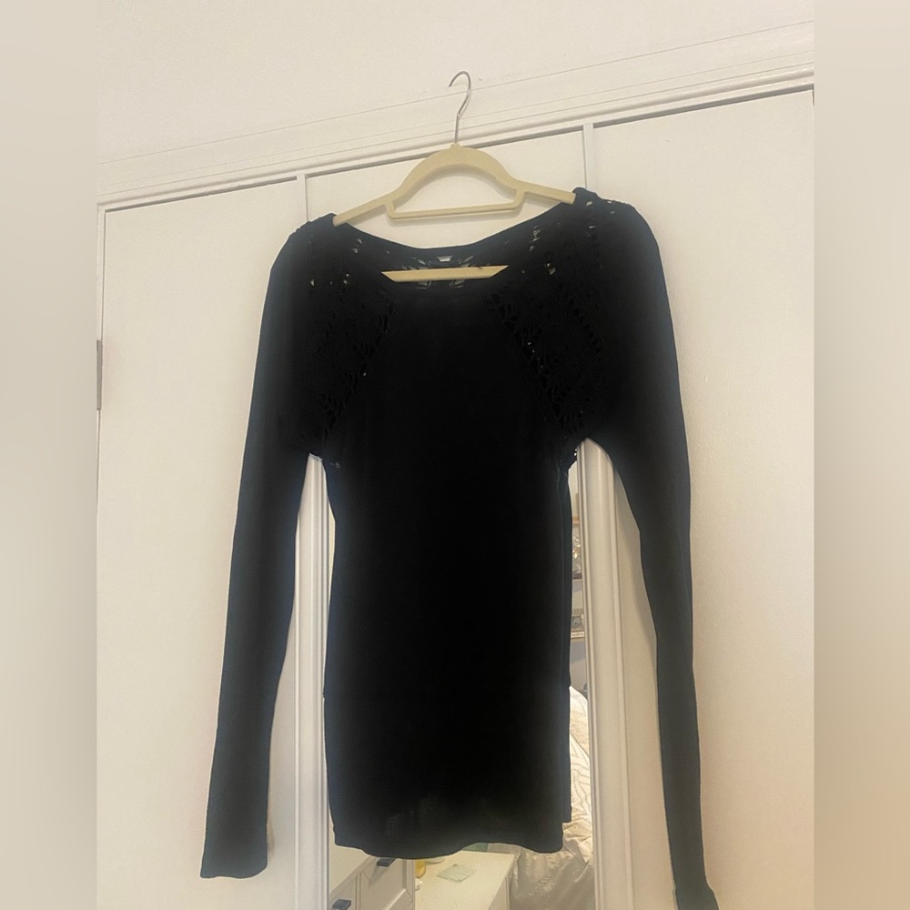 Black top with crochet details